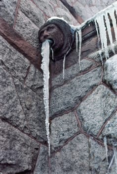 A water spout is frozen at Dartmouth College in Hanover, New Hampshire, USA.