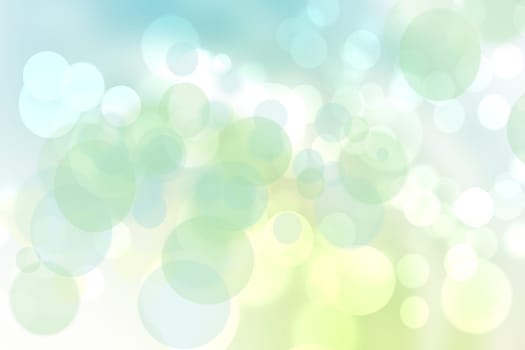 Abstract blurred vivid spring summer delicate yellow blue green bokeh background texture with bright soft color circles and bokeh lights. Card concept. Beautiful backdrop illustration.