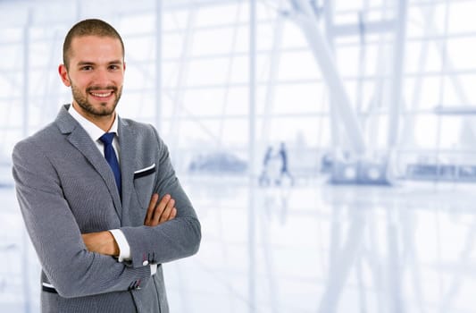 young business man portrait at the office