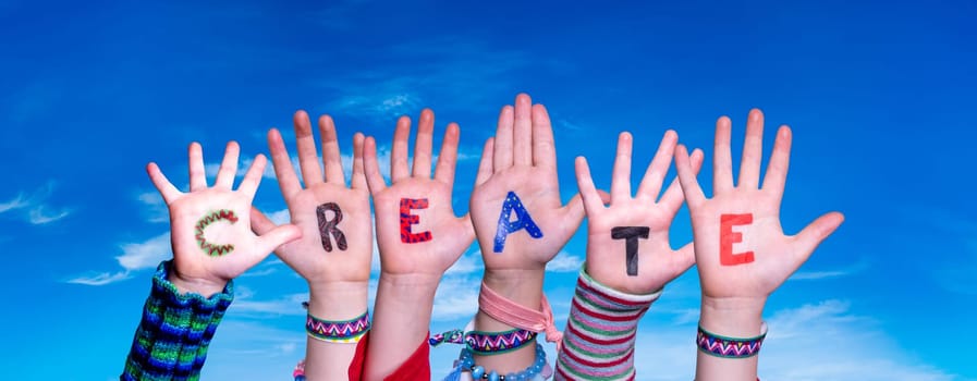 Children Hands Building Colorful English Word Create. Blue Sky As Background
