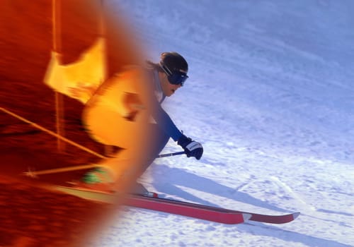 An down hill skier in on fire.