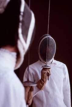 Fencing in college.