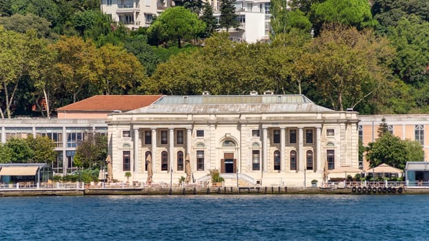 Morning view in a sunny day of Kabatas Boys High School, Kabatas Erkek Lisesi Egitim Vakfi building, suited by Bosphorus Strait in Ortakoy, Besiktas, Istanbul, Turkey