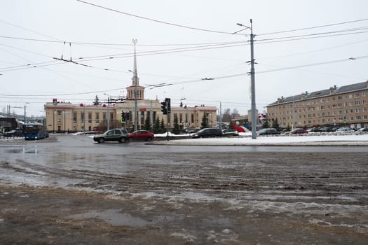 Petrozavodsk, Republic of Karelia, Russia, January 16, 2023. Gagarin Square, Lenin Avenue. The daily life of Russians. Public transport and cars are driving. Train Station. Snow, snowdrifts and slush