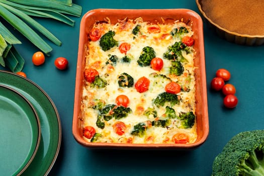 Baked potato graten with broccoli. Tasty broccoli casserole in baking dish