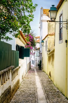 Pedestrian cobblestone street in Cascais, Portugal