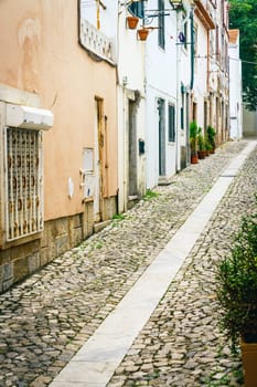 Pedestrian cobblestone street in Cascais, Portugal