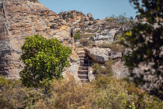 Stone stairs in tourist trail. Isalo National Park in Ihorombe Region. Wilderness landscape. Beautiful Madagascar natural landscape.