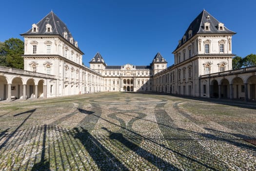 Turin, Italy - February 2023: castle exterior. Historical landmark with blue sky and daylight