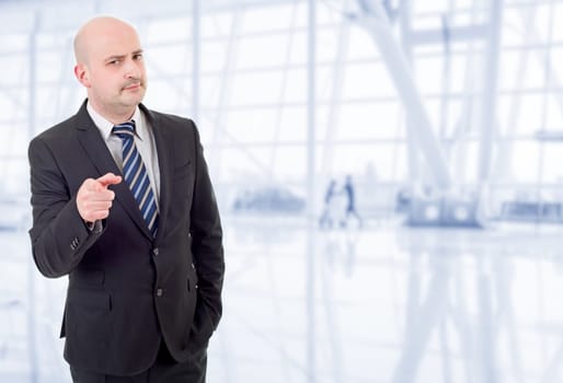 young business man pointing, at the office