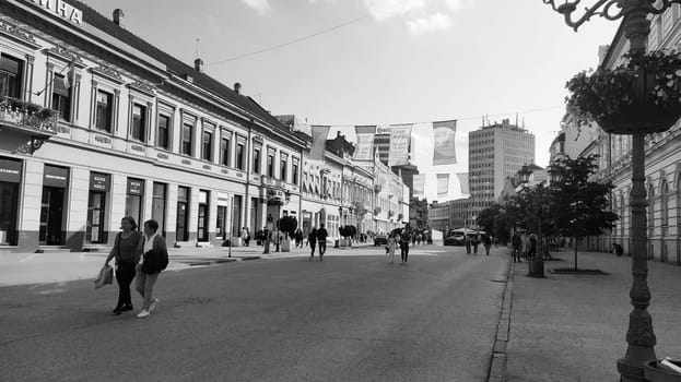Novi Sad, Serbia 30 April 2022 Hotel Vojvodina is the oldest hotel in the center of the city. European tourism facility. Street with passers-by. Freedom Square. Hotel with rooms provision of services.