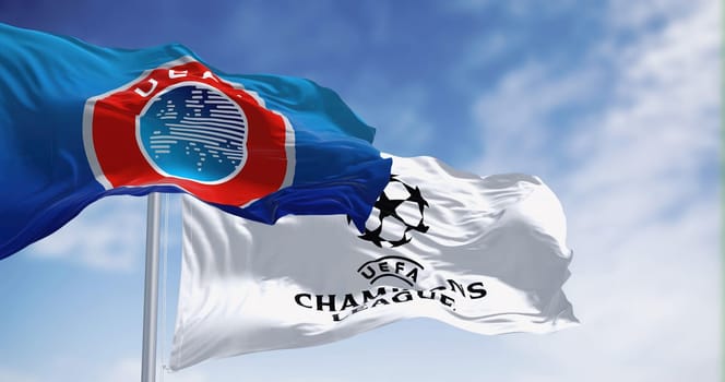Istanbul TR, Jan 2023: UEFA and UEFA Champions league flag waving together. European football competition. Rippled fabric. Illustrative editorial 3d illustration render