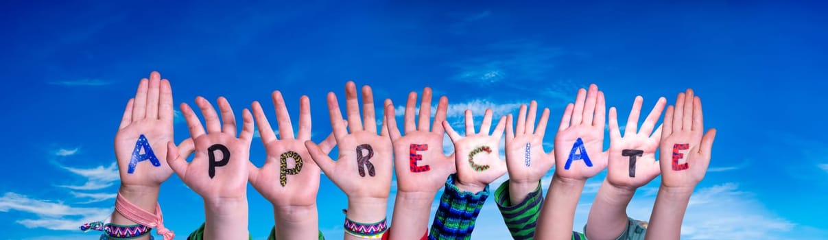 Children Hands Building Colorful English Word Appreciate. Blue Sky As Background.