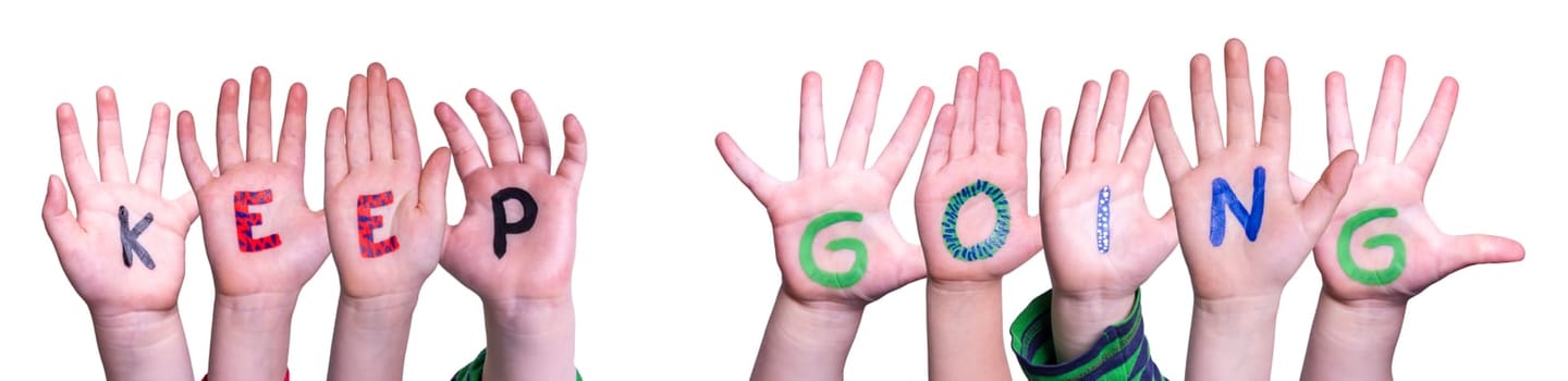 Children Hands Building Colorful English Word Keep Going. Isolated White Background.