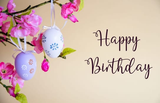 Beautiful Easter Egg Decoration With Spring Flowers. English Text Happy Birthday. Seasonal Easter Holiday Greeting Card.