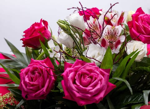 beautiful florist bouquet of roses and freesias