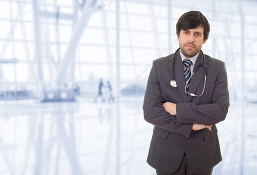 happy male doctor at the hospital