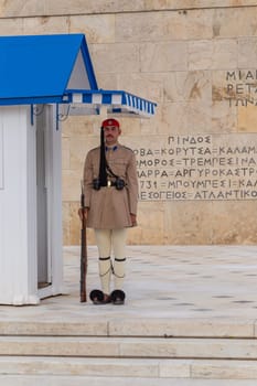 ATHENS, GREECE - MAY 06 2022: Presidential ceremonial guards - Evzones at the Tomb of the Unknown Soldier in front of the Greek Parliament, Athens, Greece