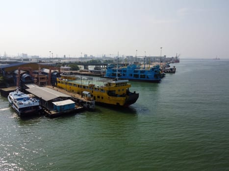 Butterworth, Penang, Malaysia - Mar 12 2022: Yellow roro ferry arrive the jetty at Butterworth