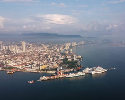 George Town, Penang, Malaysia - Apr 13 2022: Aerial view morning scene of cruise ship park at Port of George Town