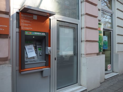 Sberbank. A depositor or client stands in front of the entrance to the branch of a subsidiary of Sberbank of Russia. Financial sanctions. Escalation in Ukraine. Sremska Mitrovica, Serbia March 3, 2022