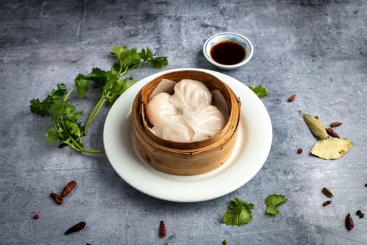 Hot Asian food traditional Hacao in a wooden plate