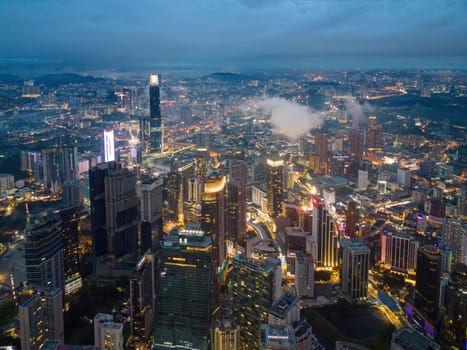 Bukit Bintang, Kuala Lumpur, Malaysia - Nov 12 2022: The vibrant city of Kuala Lumpur comes alive at night with its dazzling lights and bustling streets.