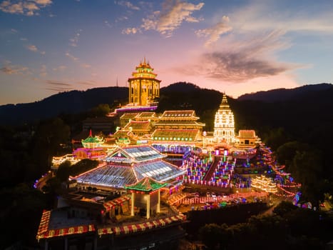 Ayer Itam, Penang, Malaysia - Feb 19 2022: Kek Lok Si temple with beauty led light decoration during sunset hour
