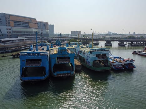 Butterworth, Penang, Malaysia - Mar 12 2022: Row of old Penang ferry park at jetty