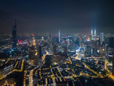 Bukit Bintang, Kuala Lumpur, Malaysia - Nov 28 2022: The skyline of KL is a stunning sight at night, with skyscrapers like the Menara KL Tower, PNB Merdeka 118 and KLCC lighting up the cityscape.
