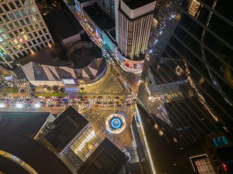 Bukit Bintang, Kuala Lumpur, Malaysia - Dec 03 2022: Aerial top down view busy car traffic at Starhill, Bukit Bintang