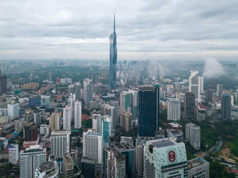 Bukit Bintang, Kuala Lumpur, Malaysia - Dec 02 2022: Aerial view Merdeka 118 and luxurious homes and high-rise apartments.
