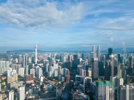 Bukit Bintang, Kuala Lumpur, Malaysia - Nov 30 2022: Aerial beauty blue sunny day weather at KL city