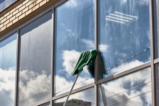 window washing, washing a street shop window. High quality photo