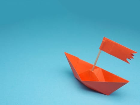 New ideas or transformation concept with a paper boat, transformation or teamwork, creativity, business concept