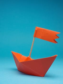 New ideas or transformation concept with a paper boat, transformation or teamwork, creativity, business concept