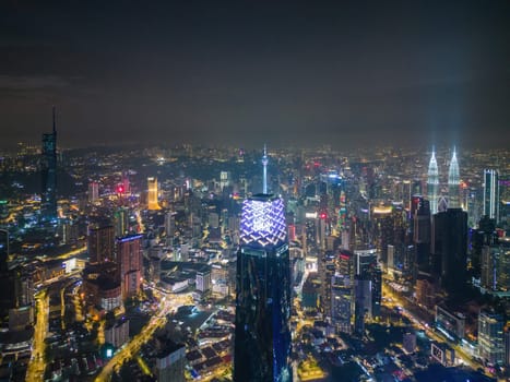 Bukit Bintang, Kuala Lumpur, Malaysia - Nov 28 2022: Kuala Lumpur skyline TRX Exchange 106, KLCC, Merdeka 118 in night aerial view