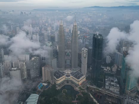 Bukit Bintang, Kuala Lumpur, Malaysia - Nov 13 2022: KLCC twin tower in the heart of the city makes it a prominent landmark that's visible from various parts of Kuala Lumpur.