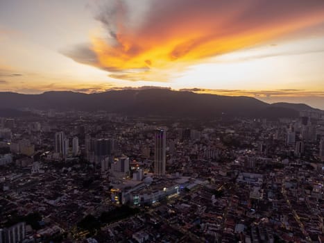 George Town, Penang, Malaysia - Aug 17 2022: Aerial view beauty sunset over the Georgetown in dusk hour