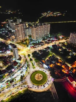 Gurney, Penang, Malaysia - Sep 24 2022: Aerial vertical view roundabout of car traffic at Gurney