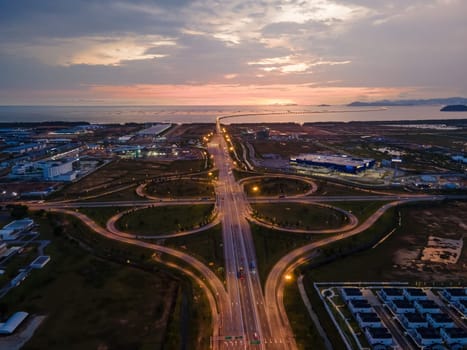 Batu kawan, Penang, Malaysia - Mar 14 2022: Drone shot highway interchange during sunset hour