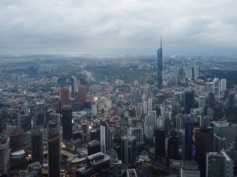Bukit Bintang, Kuala Lumpur, Malaysia - Nov 12 2022: The Merdeka 118 tower's location in the heart of the city makes it a prominent landmark, visible from various parts of KL