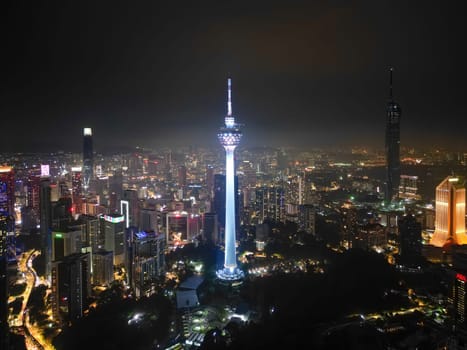 George Town, Penang, Malaysia - Nov 05 2022: Aerial view three skyscraper KL Tower, PNB118, TRX in night