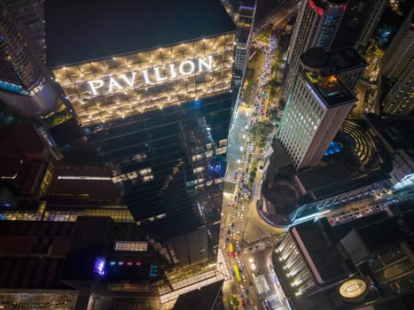Bukit Bintang, Kuala Lumpur, Malaysia - Nov 12 2022: Aerial view beauty illuminated Pavilion Kuala Lumpur tower in night