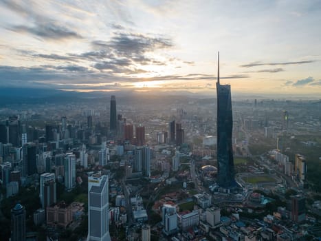 Bukit Bintang, Kuala Lumpur, Malaysia - Dec 05 2022: A bird's eye view of KL city Merdeka 118 tower and surround building with fast-paced urban lifestyle.
