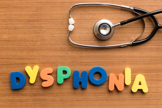 dysphonia colorful medical word and stethoscope on the wooden background