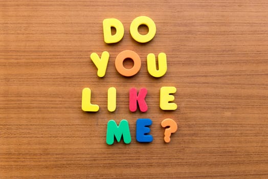 do you like me colorful words on the wooden background