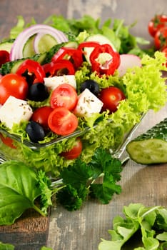 Vegetable salad bowl on kitchen table. Balanced diet.