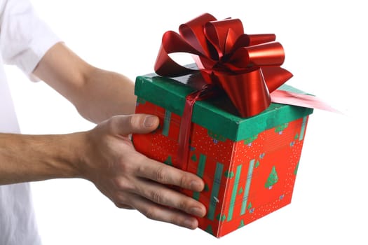 The hand gives the gift on a white background