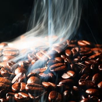 macro coffee beans in aroma smoke